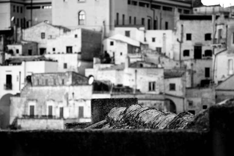 Black and White Photo with view from a roof of an ancient home in Matera