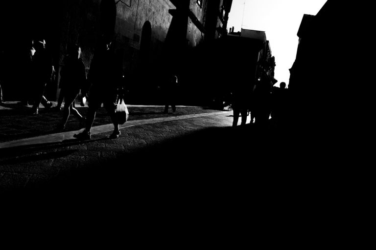 Apulia photography of people walking on an ancient street